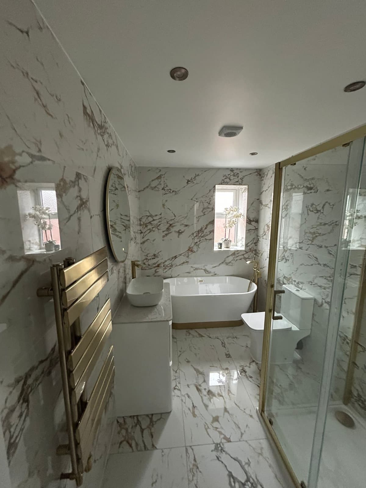 Freestanding bath and shower suite